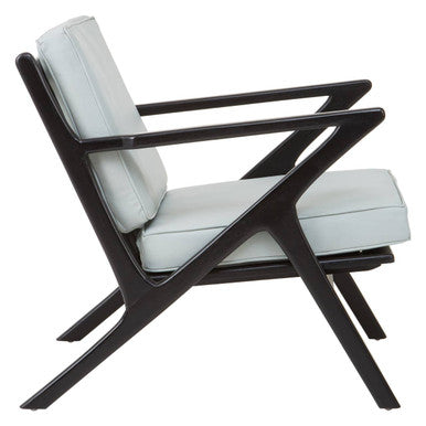 Kendari Grey Leather and Black Teak Wood Armchair – in room setting