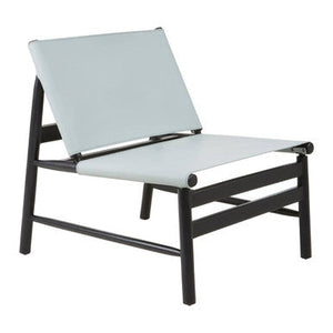 Kendari Grey Leather and Black Teak Wood Modern Sling Chair – in room setting