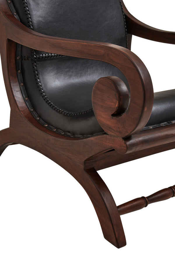 Inca Black Leather and Teak Wood Lounge Chair with Footstool – in room setting