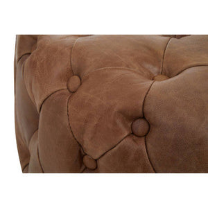 Hoxton Brown Leather Tufted Round Ottoman – in room setting