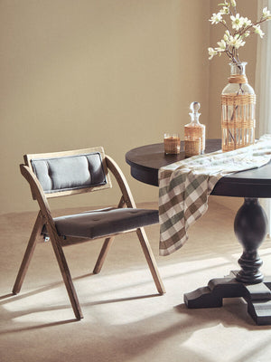 Cebu Grey Wash Wood Folding Chair with Fabric Seat – in room setting
