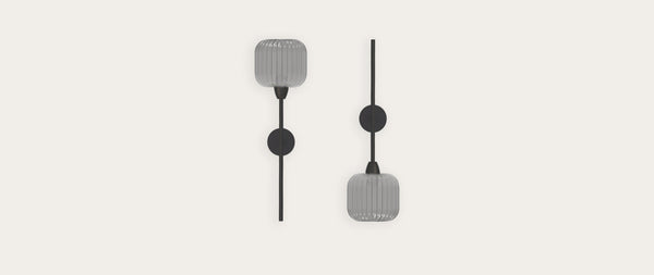 Robin Blueberry Wall light in grey, shown in a room setting