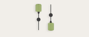 Robin Greenberry Wall light in green, shown in a room setting