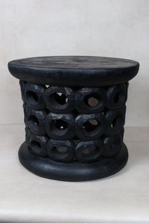 Donut Bamileke Table - Black – in room setting