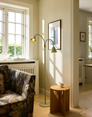 Halo Design Hygge 2-Arm Floor Lamp in Green – room setting
